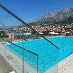 With Shared Rooftop Pool Apartment *