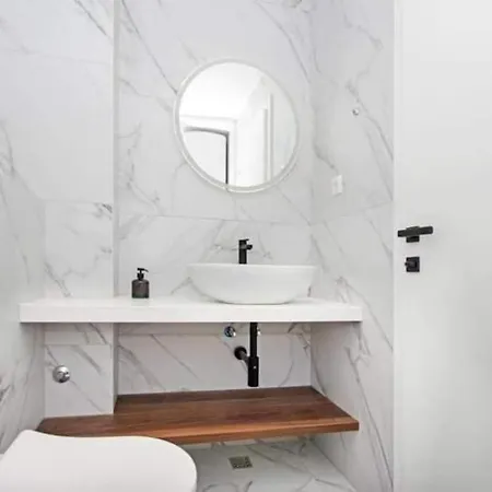 With Shared Rooftop Pool