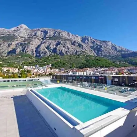 With Shared Rooftop Pool *