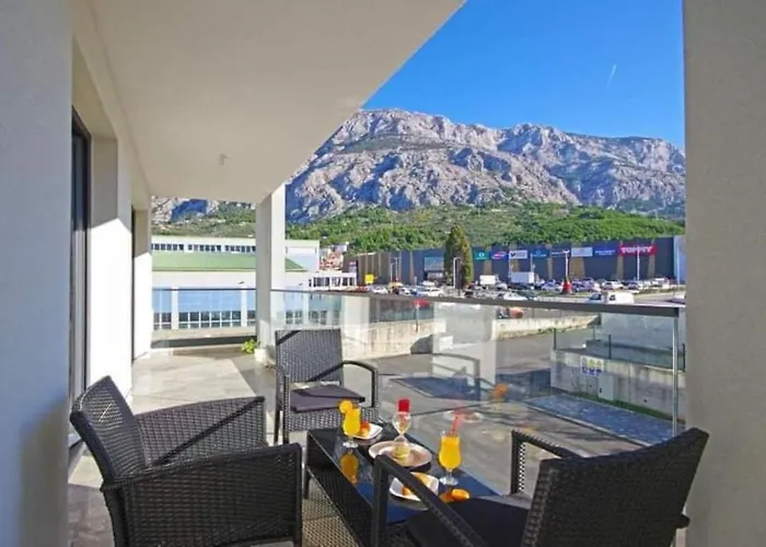 With Shared Rooftop Pool