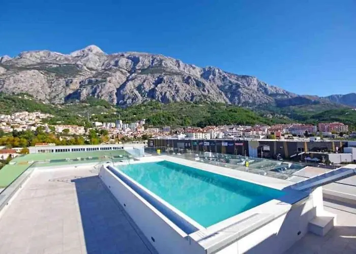 With Shared Rooftop Pool *