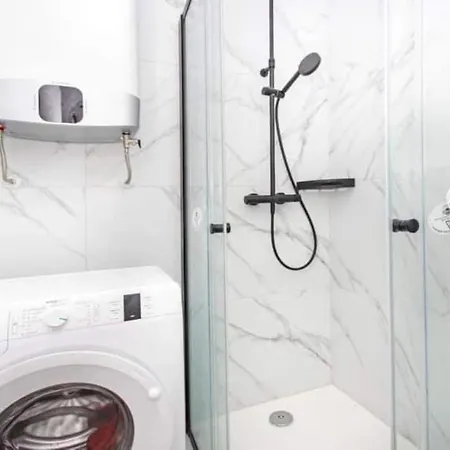 With Shared Rooftop Pool